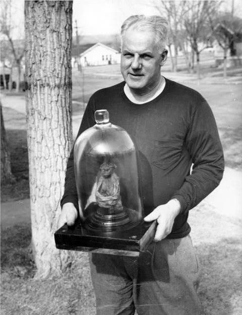 Casper history enthusiast Bob David holds the Pedro Mountain mummy, about 1950. Casper College Western History Center.